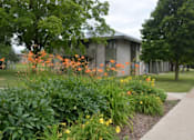 Thumbnail 19 of 21 - a garden in front of a building
