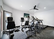 Thumbnail 23 of 60 - the gym has a slew of treadmills and reformer chairs
