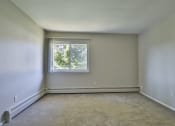 Thumbnail 37 of 43 - an empty room with a window and white walls