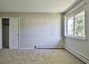 Thumbnail 38 of 43 - an empty room with white walls and a window