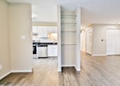 Thumbnail 26 of 39 - A kitchen with a white cabinetry and a white fridge.