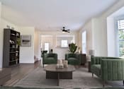 Thumbnail 4 of 93 - A living room with a green chair and a grey rug.