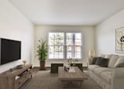 Thumbnail 26 of 31 - A living room with a couch, a coffee table, a television, and a potted plant.