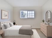 Thumbnail 30 of 31 - A bedroom with a large bed, a dresser, and a window.