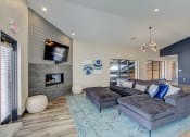 Thumbnail 8 of 43 - a large living room with a large couch and a large tv on the wall