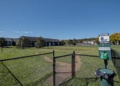 Thumbnail 23 of 43 - a baseball field in front of a building
