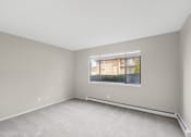 Thumbnail 9 of 21 - an empty room with a window in it