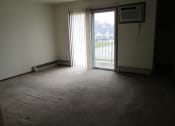 Thumbnail 3 of 5 - an empty room with a sliding glass door