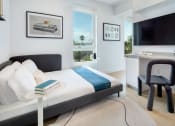 Thumbnail 15 of 24 - Bedroom With TV at Miles at Harvard, Los Angeles, California