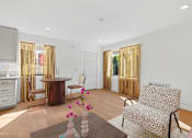 Thumbnail 7 of 23 - Spacious living area in Mar Vista apartment with Plank Flooring and Large windows allowing for gorgeous natural lighting