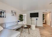 Thumbnail 4 of 36 - Living Room With TV at Carmel at the Colony, Ontario, California