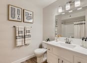 Thumbnail 12 of 36 - Bathroom With Vanity Lights at Carmel at the Colony, Ontario, California