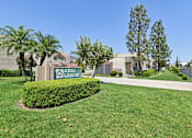 Thumbnail 1 of 30 - Azusa Gardens Monument Sign surrounded by lush greenery
