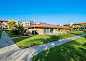Thumbnail 3 of 30 - Azusa Gardens Building Exterior with Park-Like Landscaping