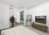 Thumbnail 17 of 31 - Additional View of Bedroom in 2 Bed 1 Bath Option B Bent Tree Apartment with plush carpeted flooring and a spacious closet