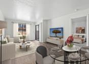 Thumbnail 28 of 37 - A living room with a couch, chairs, a coffee table, and a painting on the wall.