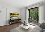 Thumbnail 33 of 37 - Living Room in 1 Bed 1 Bath A floor plan at California place apartments with wood-style plank flooring, and large sliding doors leading to a private balcony surrounded by lush trees providing a beautiful view and cozy feel