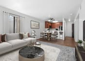 Thumbnail 20 of 37 - Spacious living area in 2 Bedroom California place apartment home with plush carpeted flooring and large sliding doors leading to private patio/balcony. Open concept floor plan layout leads to the dining nook with wood-style plank flooring and a ceiling fan