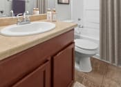 Thumbnail 25 of 37 - Bathroom 2 in 2 Bedroom California Place apartment home with a shower/tub, large vanity mirror, and plenty of cabinet space