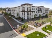 Thumbnail 25 of 69 - an aerial view of a building with a street in front of it at The Venue at Orange Apartments, California, 92373