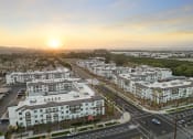 Thumbnail 29 of 69 - an aerial view of an urban city at sunset at The Venue at Orange Apartments, Redlands, CA