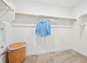 Thumbnail 64 of 69 - our spacious walk in closet is loaded with clothes and towels and has a large closet