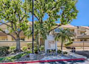 Thumbnail 34 of 36 - Call box entry drive way at Carmel at the Colony, California, 91761