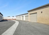 Thumbnail 38 of 38 - Detached garages with multiple enclosed parking spaces at Altitude Apartments, Moreno Valley, CA 92553