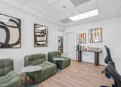 Thumbnail 2 of 38 - Comfortable lounge area with green modular seating at Altitude Apartments, Moreno Valley, 92553