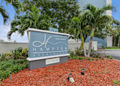 Thumbnail 16 of 37 - Entrance Sign at Hampton Apartments, Clearwater, FL
