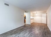 Thumbnail 12 of 15 - Empty living room at Pineview Apartments, in Clearwater, FL 33755