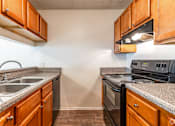 Thumbnail 10 of 15 - Kitchen at Pineview Apartments, in Clearwater, FL 33755