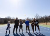 Thumbnail 7 of 33 - a group of people playing tennis on a tennis court at The Residences at Tesson Ridge, Saint Louis, 63128
