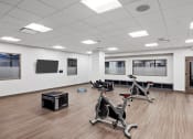 Thumbnail 11 of 33 - the gym in the new building has a lot of exercise bikes at The Residences at Tesson Ridge, Saint Louis, Missouri