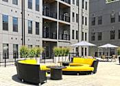 Thumbnail 19 of 46 - Couch outside at 1400 Russell Apartments, Saint Louis, Missouri