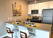 Thumbnail 13 of 46 - Kitchen breakfast bar at 1400 Russell Apartments, Saint Louis