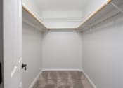 Thumbnail 16 of 31 - Master Walk-in Closet