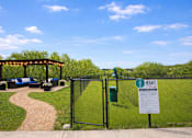 Thumbnail 20 of 24 - A sign in front of a fence that says "HEIGHTS".
