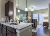 Thumbnail 3 of 27 - Model Kitchen with Pendant Lighting