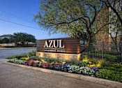 Thumbnail 28 of 28 - A sign that says "AZUL Apartment Homes" is lit up at dusk.