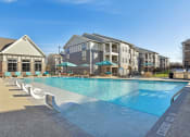 Thumbnail 1 of 27 - the preserve at ballantyne commons pool and apartment buildings