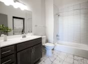 Thumbnail 9 of 22 - bathroom in studio apartment at Myers Medical Lofts