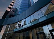 Thumbnail 2 of 24 - A modern building with the number 300 on it.