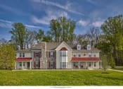 Thumbnail 1 of 6 - a rendering of a house with a red and white roof and a lawn