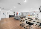 Thumbnail 13 of 26 - leasing office space with couches and tables  at Union at Wiley, Iowa, 52404
