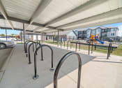 Thumbnail 8 of 26 - a playground at the whispering winds apartments in pearland, tx  at Union at Wiley, Cedar Rapids, Iowa