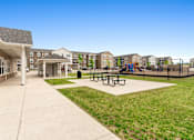 Thumbnail 8 of 22 - Playground and picnic tables at Union at North Crossing, Waterloo, Iowa