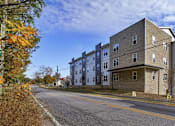 Thumbnail 5 of 13 - A street view of a residential area with apartment buildings.at Union at Crescent, Bloomington, IN  