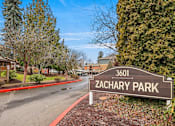 Thumbnail 1 of 18 - Zachary Park Apartments Property Sign