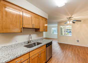 Thumbnail 26 of 66 - Cascade Woods kitchen sink and dishwasher